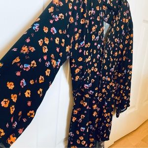 FREE PEOPLE L'Amour Printed Romper Floral
Black 4